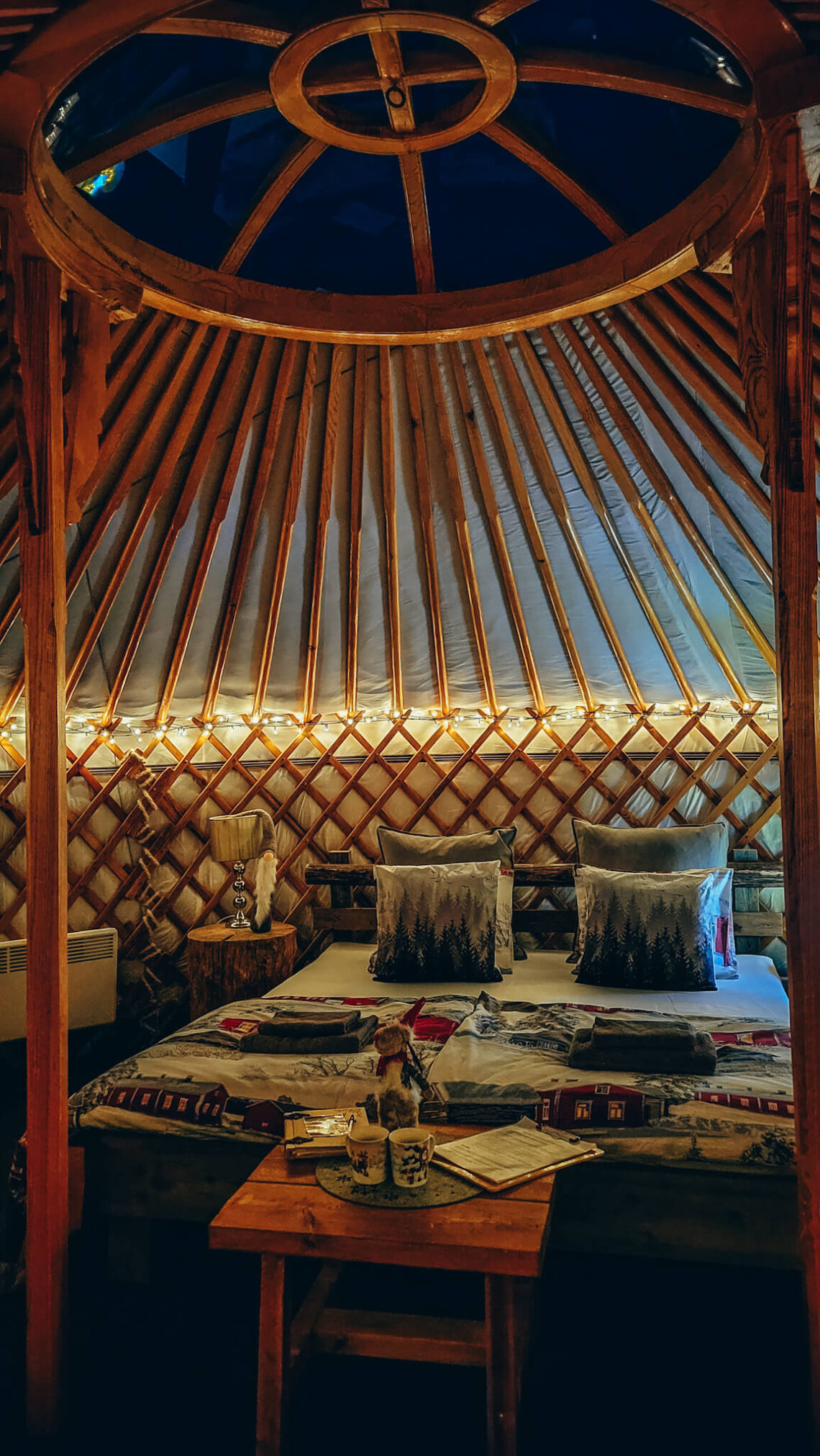 Inside yourt Cozy bed and glass ceiling